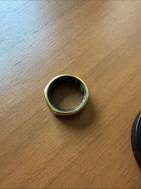 Oura Gold heritage model 3 size 8 with wear